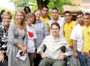 Dan Eley with a group of graduates from one of the charity's training schemes